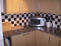 Service with a tile - luxury kitchen tiling